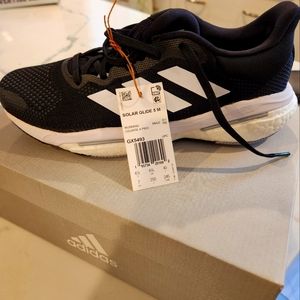 Black Adidas running sneaker size 7. Brand new. Never worn.